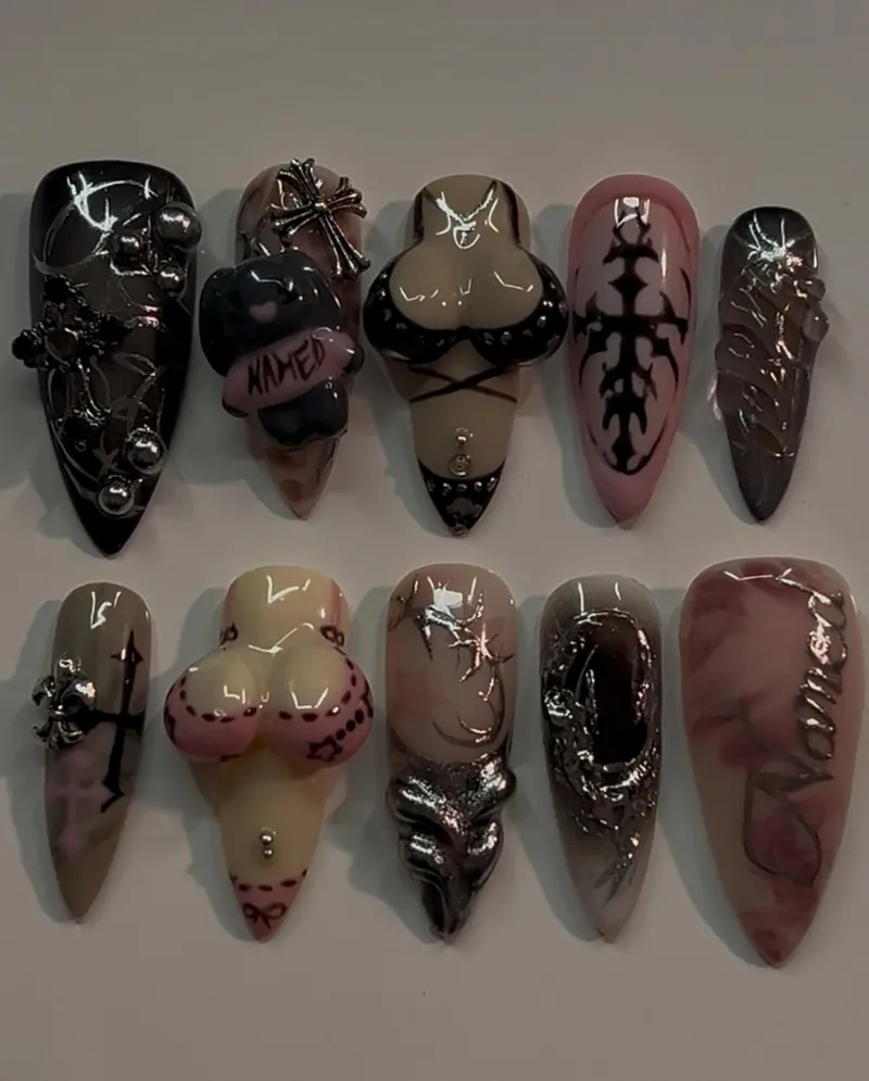Ten press-on stilettos for the NAMED nails comp: brown and black chrome with 3D crosses, hearts and a figure